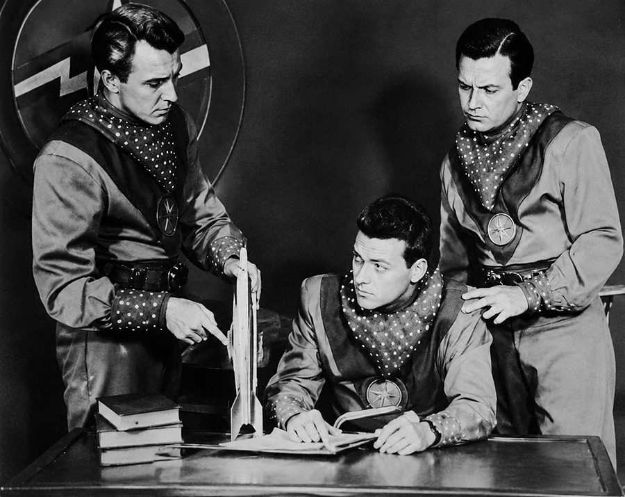 Vintage Tom Corbett Space Cadet publicity photo showing Roger Manning, Astro, and Tom Corbett in cadet uniforms.